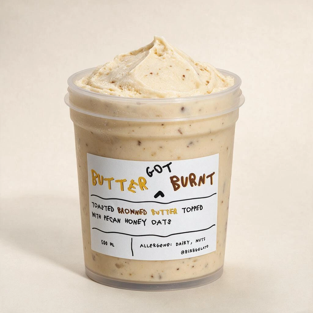 Butter Got Burnt gelato, with browned butter flecks and pecan honey oats, in the finished Birb pint